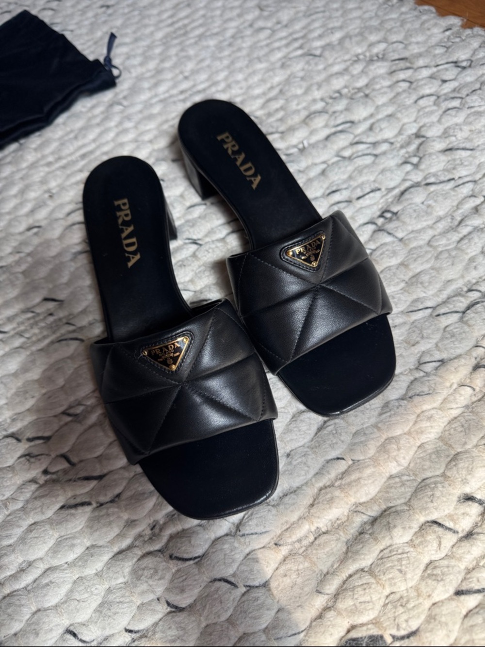 Prada Black Quilted Leather Heeled Slides with Gold Logo